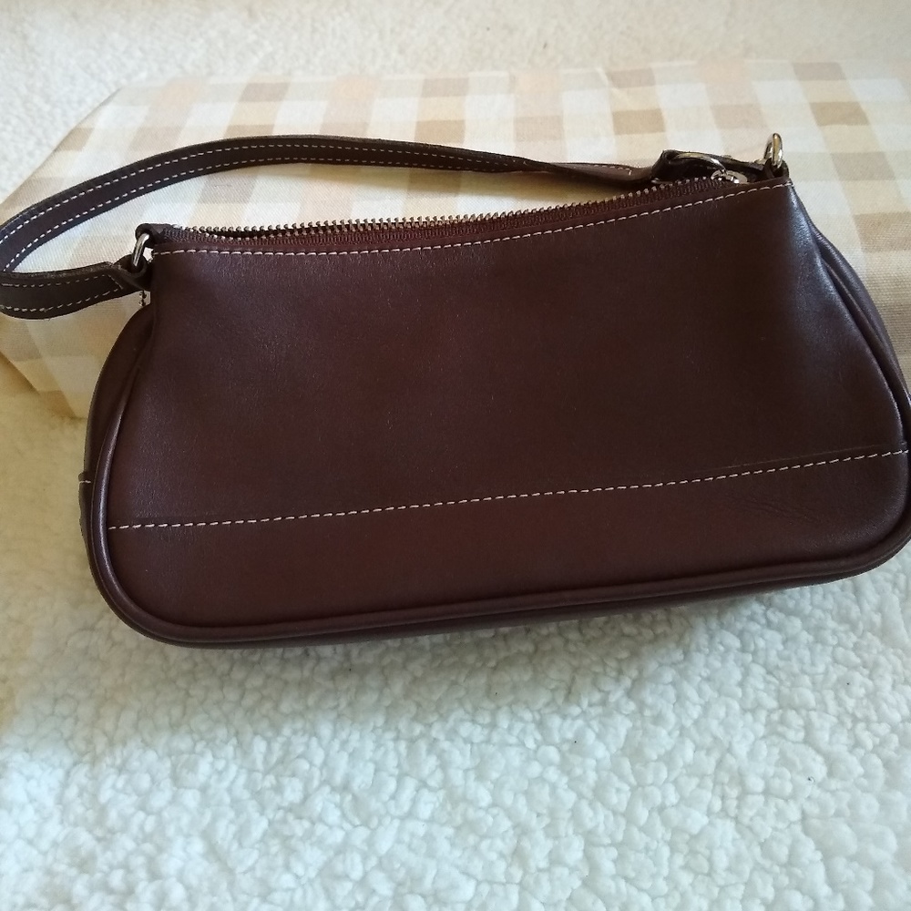 Brown Coach purse with leather hanging tag
